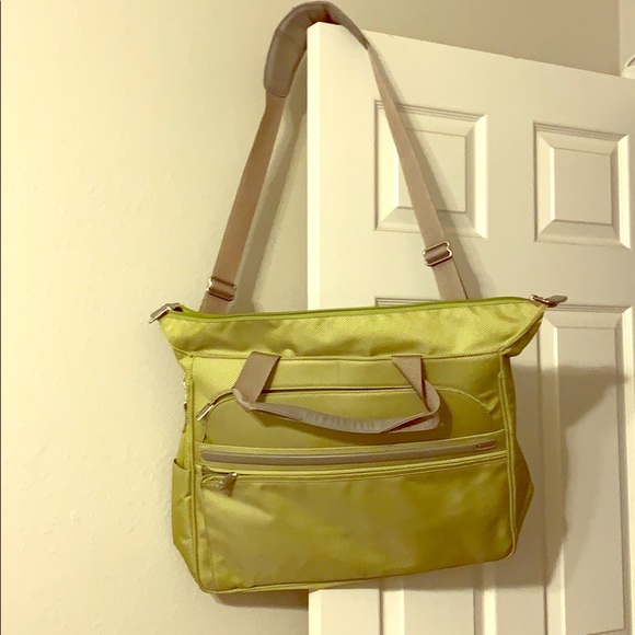 Tumi Handbags - Tumi green weekender bag